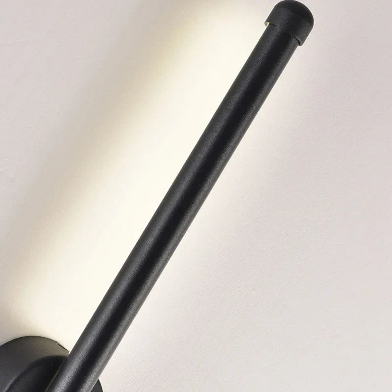 Applique murale LED noire avec barre lumineuse et cercle central, design minimaliste moderne pour salons, chambres et espaces professionnels.