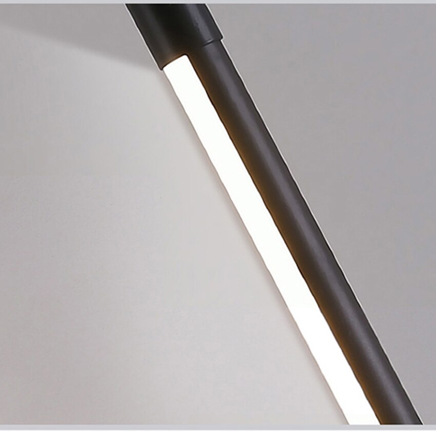Lampadaire fin en aluminium noir au design minimaliste avec lumière LED dimmable, idéal pour salons, chambres et bureaux modernes.