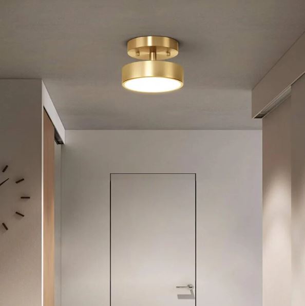 plafonnier rond doré en cuivre design moderne avec lumière LED intégrée